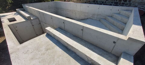 Piscine béton à débordement